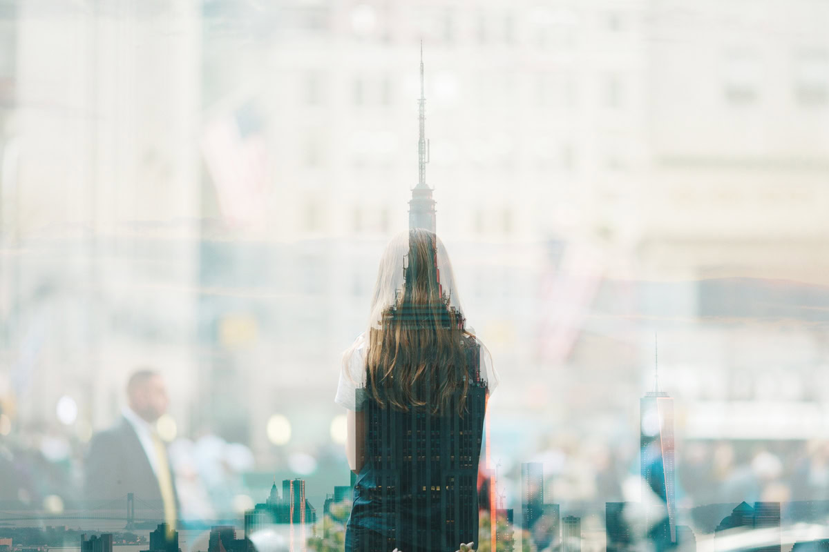large office tower in reflection of window