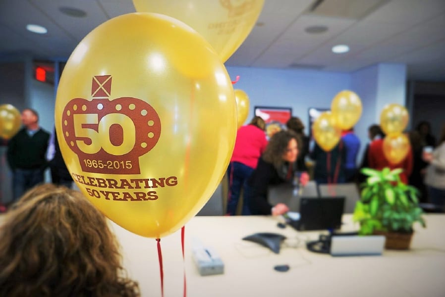 Crown 50th part celebrations with yellow balloons that say 