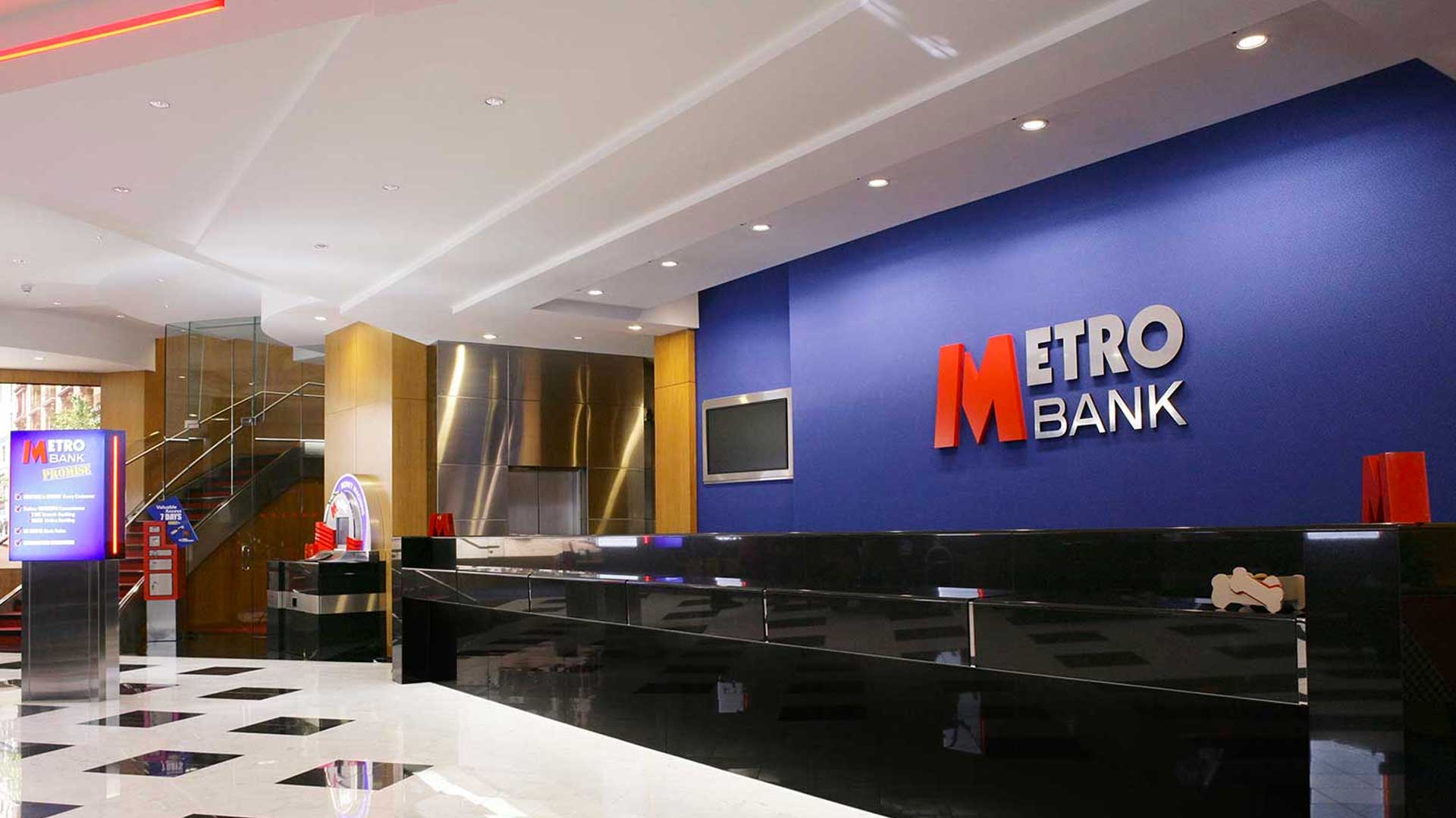 Metro Bank interior with bank logo and desk