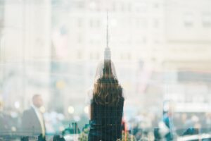 large office tower in reflection of window