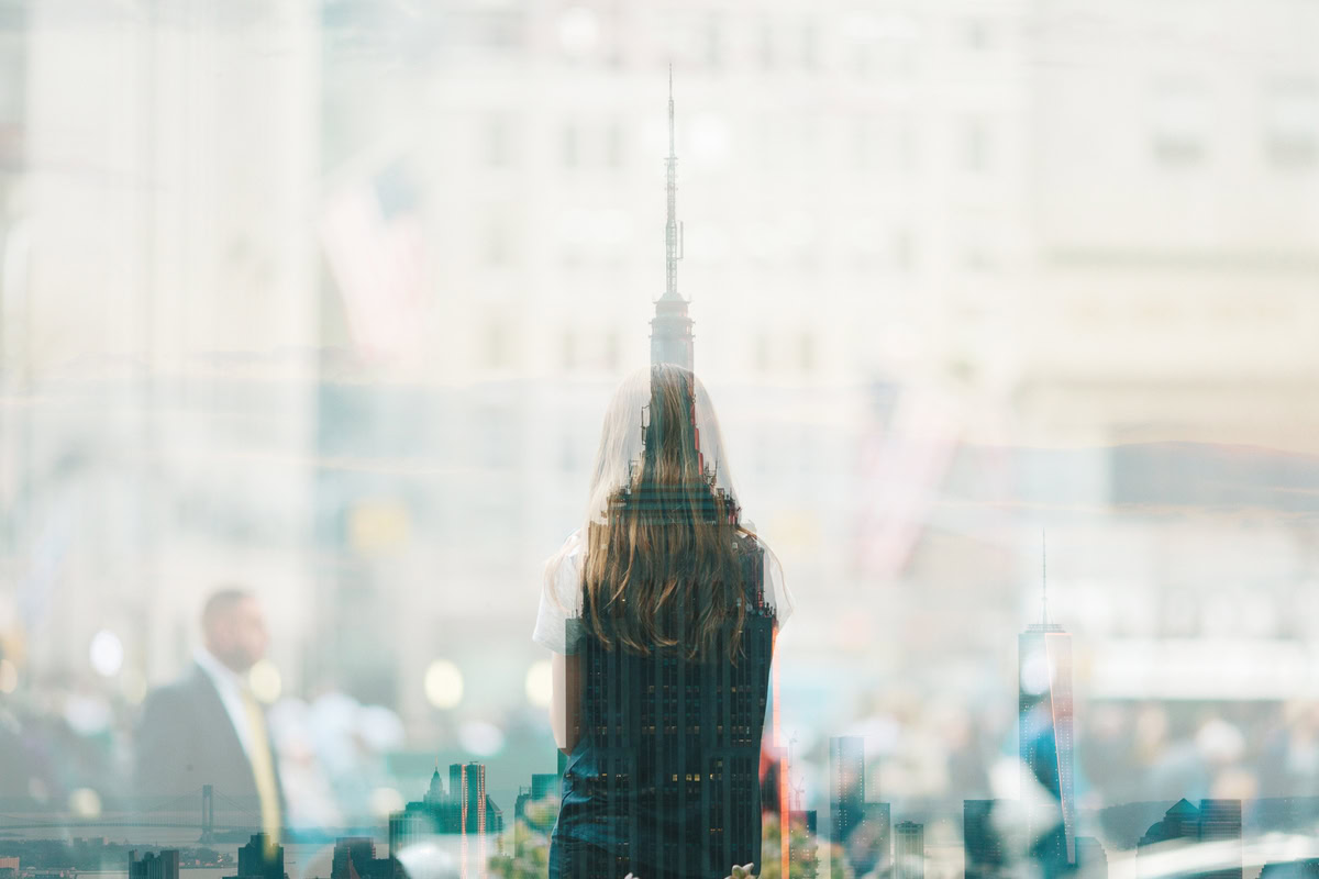 large office tower in reflection of window